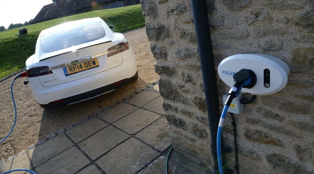 Car plugged into EV charger