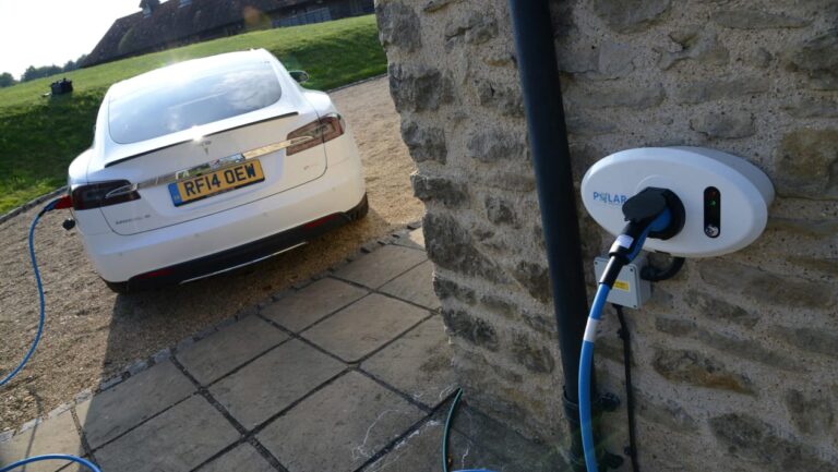 Car plugged into EV charger