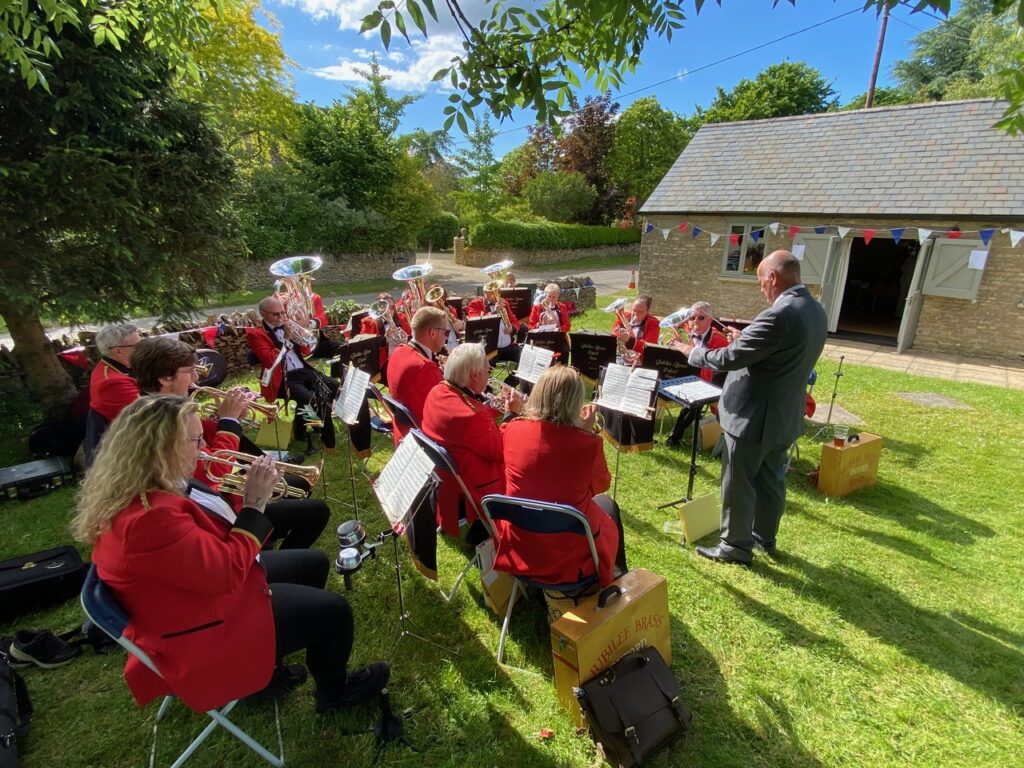 Band playing in front of Asthal Leigh Village Hall