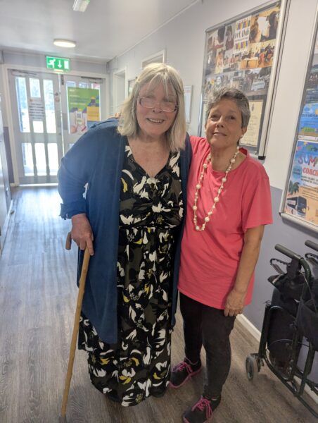 Sheila and Mary standing for a photo