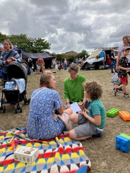 Children playing at the big green day